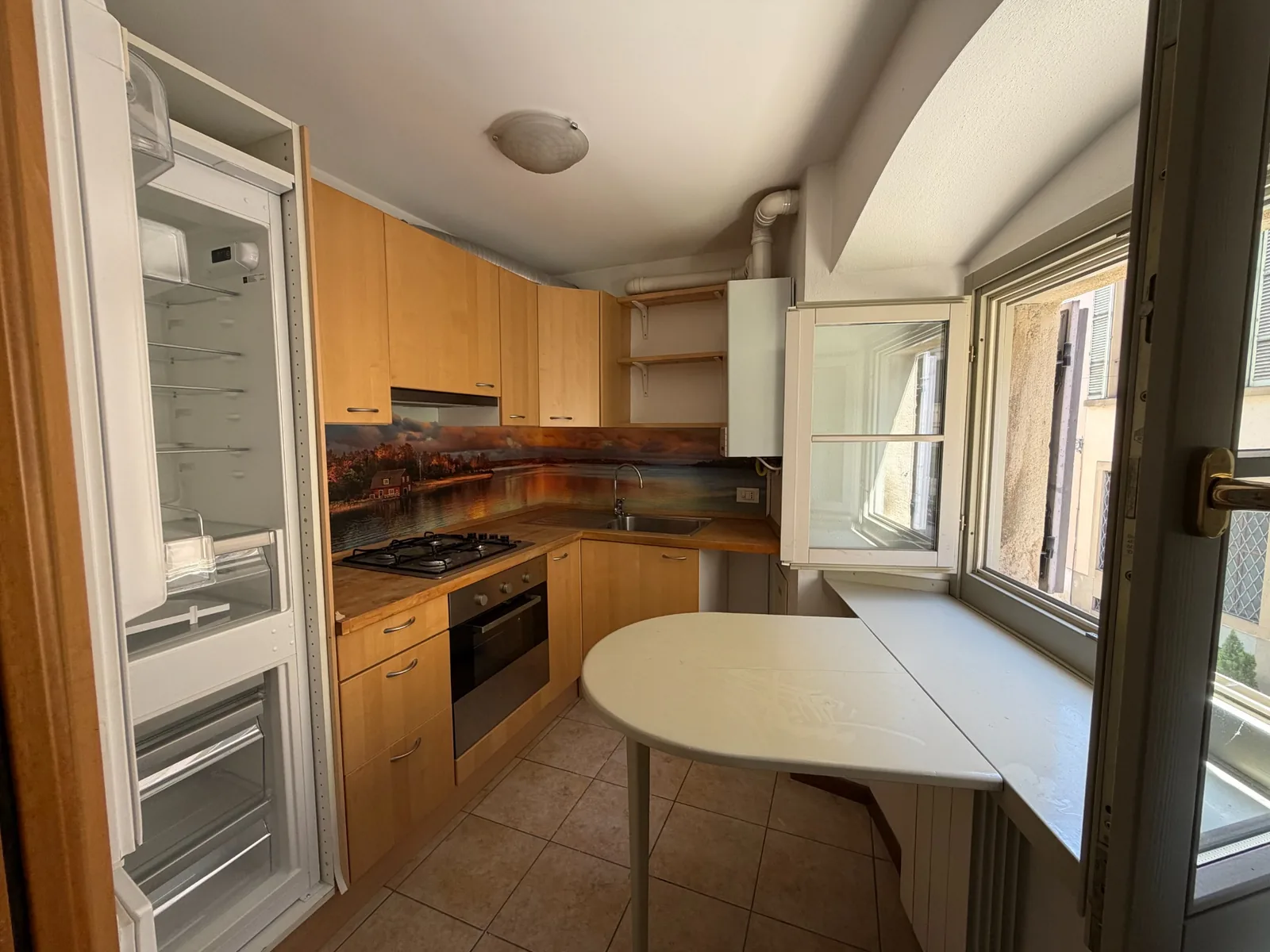 Cucina separata e abitabile del bilocale in Via Tasso